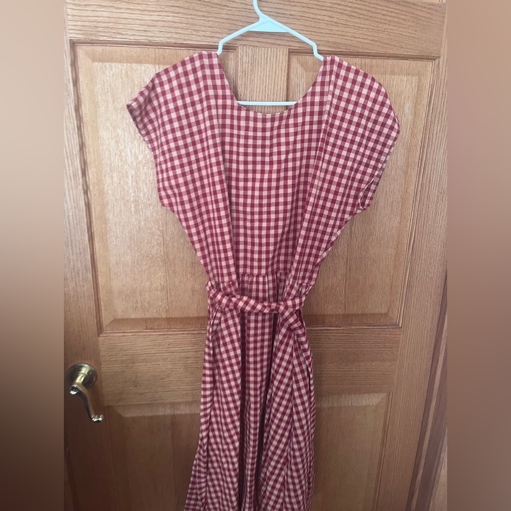 Let’s Backtrack Red Gingham cotton midi Dress
Pockets